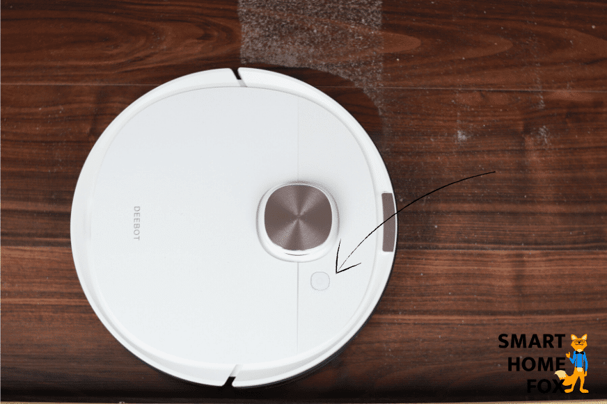 Control button on top of the Ecovacs Deebot OZMO T
